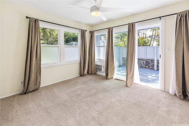 44-1303 Kou Pl Unit 1103, Kaneohe, HI 96744 - spare room with ceiling fan, carpet, and a wealth of natural light