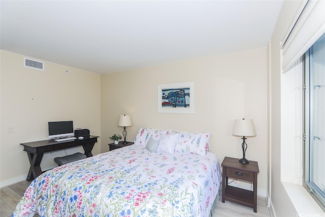 1551 Ala Wai Blvd Unit 703, Honolulu, HI 96815 - bedroom with light wood-style floors, baseboards, and visible vents