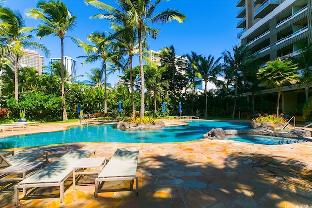 1551 Ala Wai Blvd Unit 703, Honolulu, HI 96815 - community pool with a patio and a hot tub