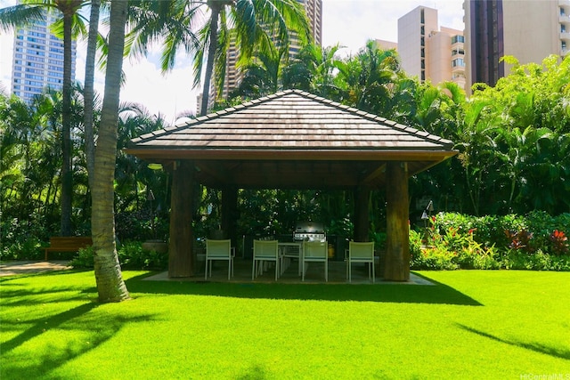 1551 Ala Wai Blvd Unit 703, Honolulu, HI 96815 - view of home's community with a lawn, exterior kitchen, and a gazebo