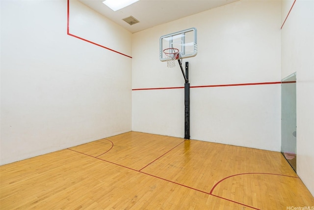 view of sport court featuring basketball court
