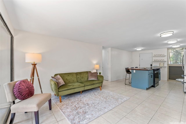 68-090 Au St Unit E102, Waialua, HI 96791 - living room with light tile patterned flooring