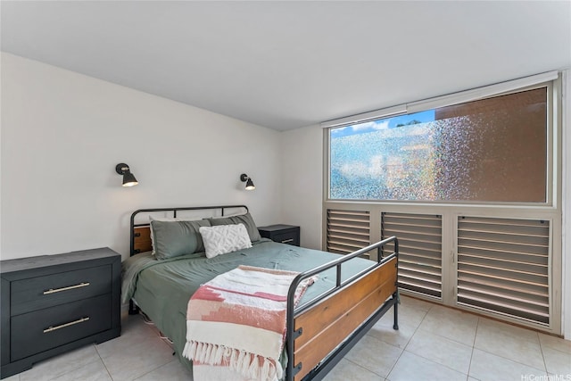 68-090 Au St Unit E102, Waialua, HI 96791 - bedroom with light tile patterned floors