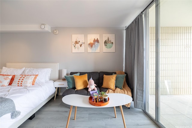 bedroom featuring wood finished floors