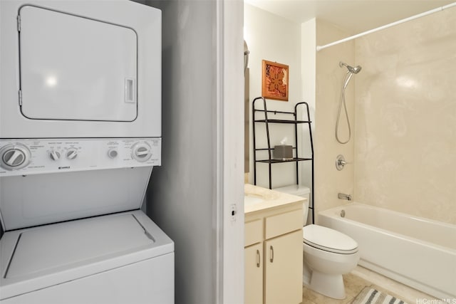 interior space with laundry area and stacked washer and clothes dryer