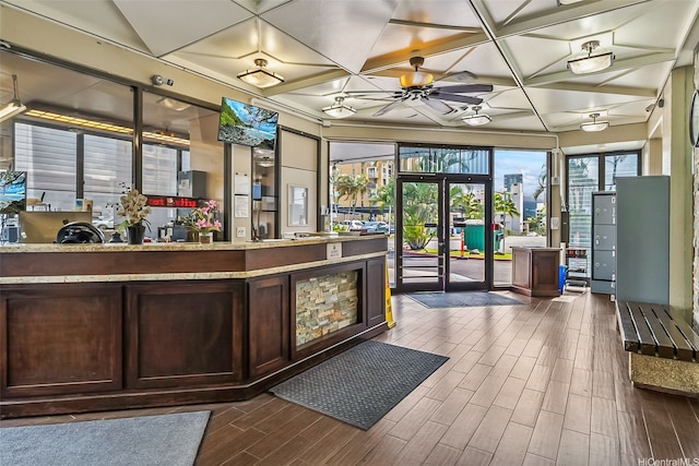 welcome area featuring a ceiling fan