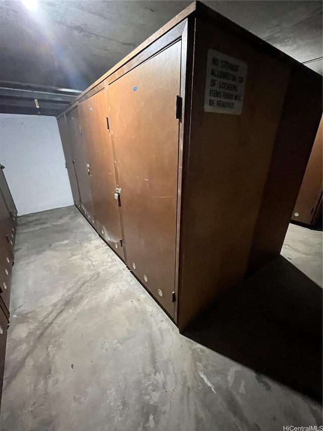 interior space with unfinished concrete flooring