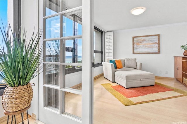 1600 Ala Moana Blvd Unit 2406, Honolulu, HI 96815 - sitting room with wood finished floors, ornamental molding, and baseboards