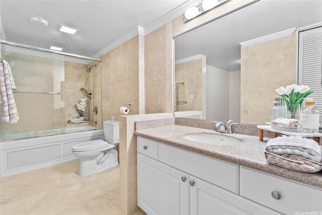 1600 Ala Moana Blvd Unit 2406, Honolulu, HI 96815 - full bathroom featuring crown molding, tile patterned flooring, toilet, bath / shower combo with glass door, and tile walls