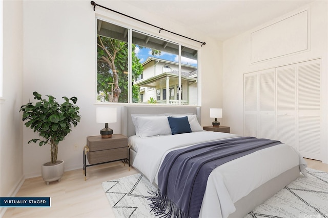 95-1090 Puneki St, Mililani, HI 96789 - bedroom with wood finished floors, a closet, and baseboards