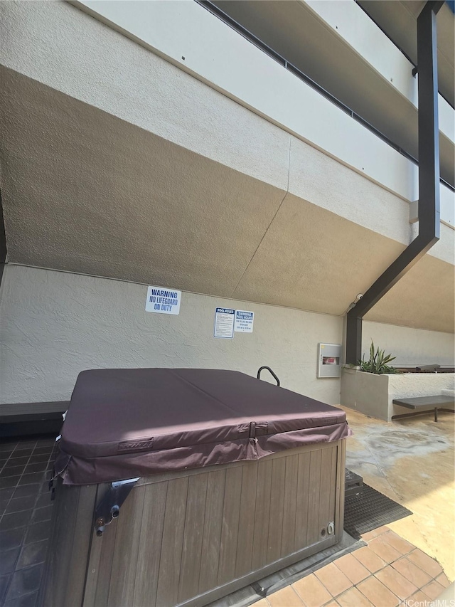1535 Pensacola St Unit 36, Honolulu, HI 96822 - view of patio / terrace featuring a hot tub
