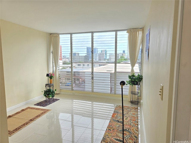 1535 Pensacola St Unit 36, Honolulu, HI 96822 - interior space featuring a wall of windows, baseboards, and a view of city