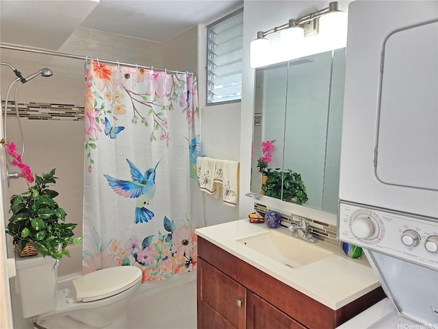 1535 Pensacola St Unit 36, Honolulu, HI 96822 - full bathroom featuring stacked washer and clothes dryer, toilet, and vanity