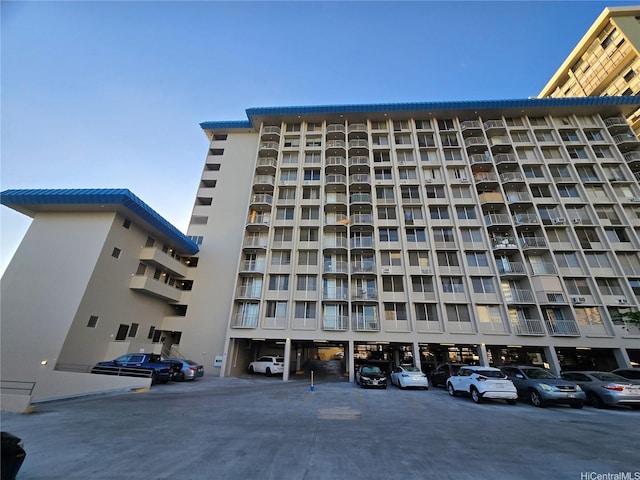 1535 Pensacola St Unit 36, Honolulu, HI 96822 - view of apartment building / complex with covered and uncovered parking