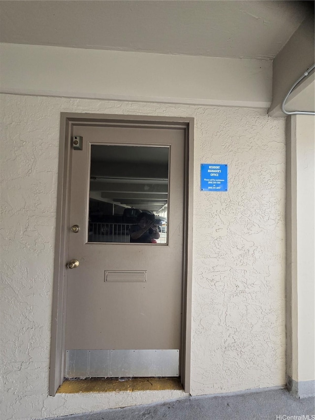 1535 Pensacola St Unit 36, Honolulu, HI 96822 - detailed view of stucco siding