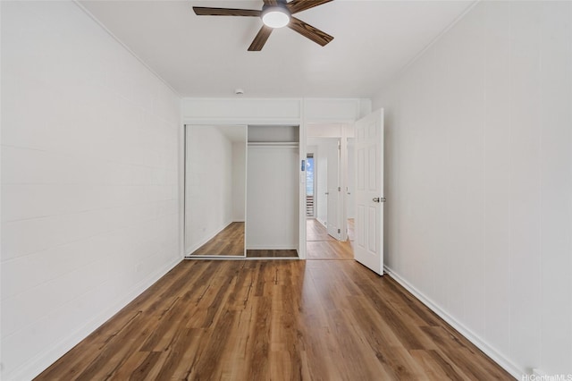 92-801 Makakilo Dr Unit H50, Kapolei, HI 96707 - unfurnished bedroom with a closet, ornamental molding, ceiling fan, and wood finished floors
