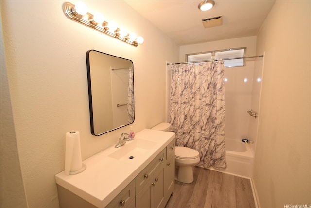 3152 Mokihana Sts, Honolulu, HI 96816 - full bath with wood finished floors, toilet, vanity, and shower / tub combo