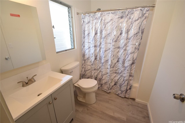 3152 Mokihana Sts, Honolulu, HI 96816 - full bath featuring wood finished floors, toilet, vanity, and shower / bath combination with curtain
