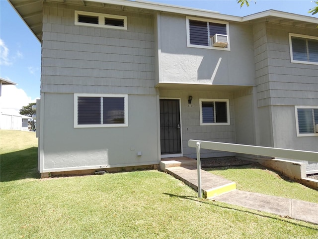 view of front facade with a front lawn
