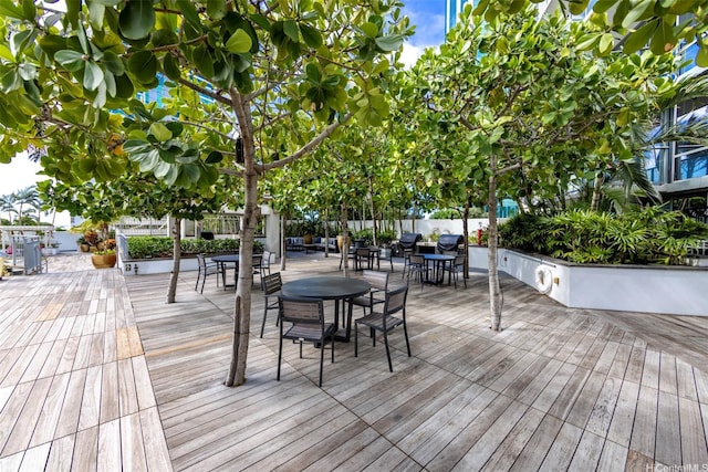 1189 Waimanu St Unit 2308, Honolulu, HI 96814 - wooden deck featuring fence and outdoor dining area