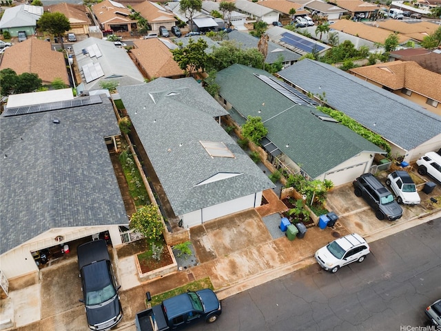 birds eye view of property with a residential view