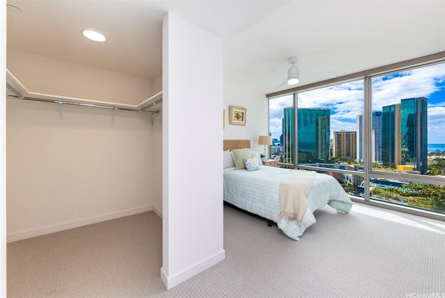 1001 Queen St Unit 1804, Honolulu, HI 96814 - bedroom with carpet, baseboards, access to outside, a view of city, and floor to ceiling windows