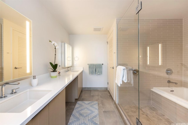 1001 Queen St Unit 1804, Honolulu, HI 96814 - bathroom featuring a tile shower, tiled tub, double vanity, and tile patterned floors