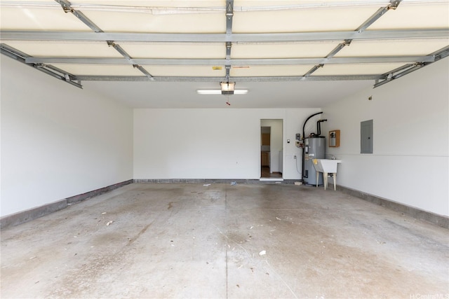 91-1459 Pukanala St, Ewa Beach, HI 96706 - garage with baseboards, a garage door opener, electric panel, and electric water heater