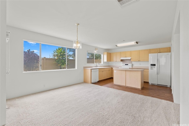 91-1459 Pukanala St, Ewa Beach, HI 96706 - kitchen featuring a sink, light brown cabinets, white appliances, light countertops, and visible vents