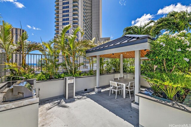 1631 Kapiolani Blvd Unit 3706, Honolulu, HI 96814 - view of patio / terrace featuring exterior kitchen, a gazebo, and outdoor dining space