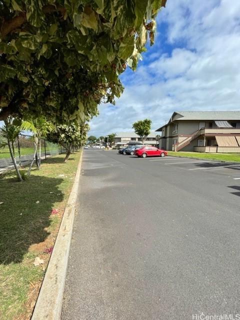 view of street with curbs