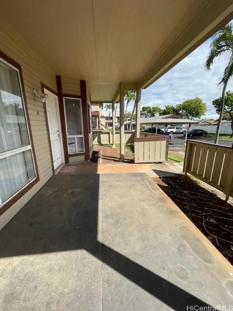 view of patio / terrace featuring fence