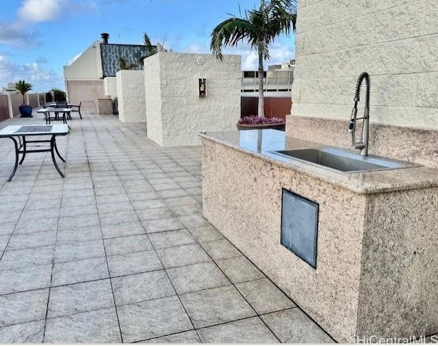 view of patio featuring a sink