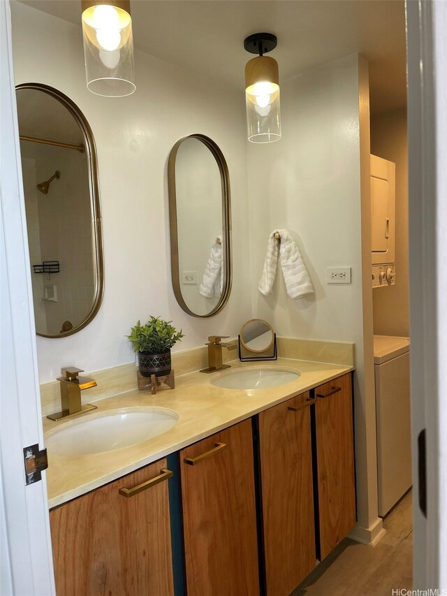 444 Nahua St Unit 1104, Honolulu, HI 96815 - full bathroom featuring double vanity and wood finished floors