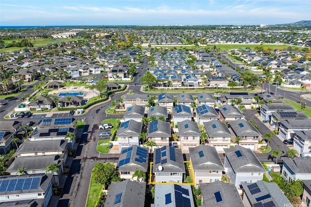 aerial view of property and surrounding area with nearby suburban area