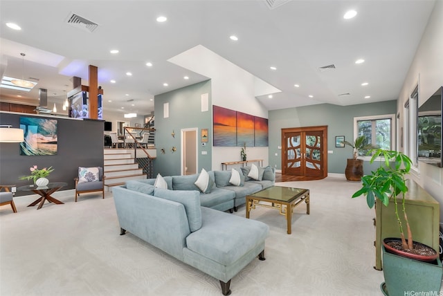 45-020 Namoku St, Kaneohe, HI 96744 - living area with light carpet, stairway, recessed lighting, and baseboards
