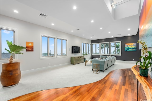 45-020 Namoku St, Kaneohe, HI 96744 - living room with light carpet, recessed lighting, light wood finished floors, and baseboards