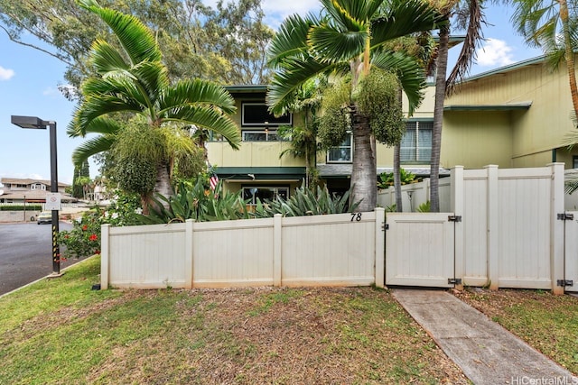 92-1288 Kikaha St Unit 78, Kapolei, HI 96707 - view of front of house with fence and a gate