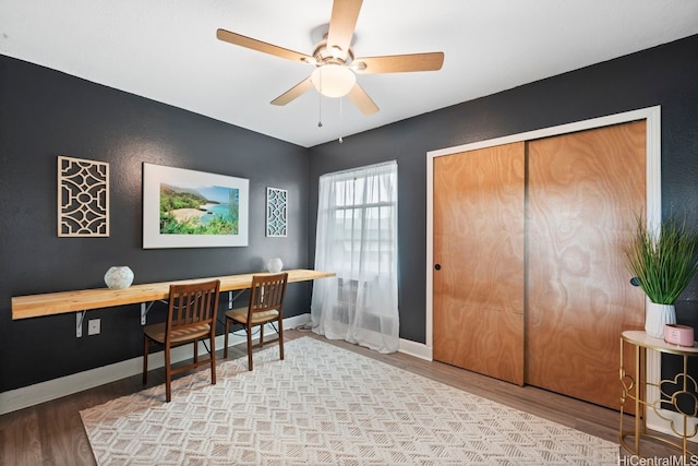 92-1288 Kikaha St Unit 78, Kapolei, HI 96707 - home office featuring a ceiling fan, baseboards, and wood finished floors