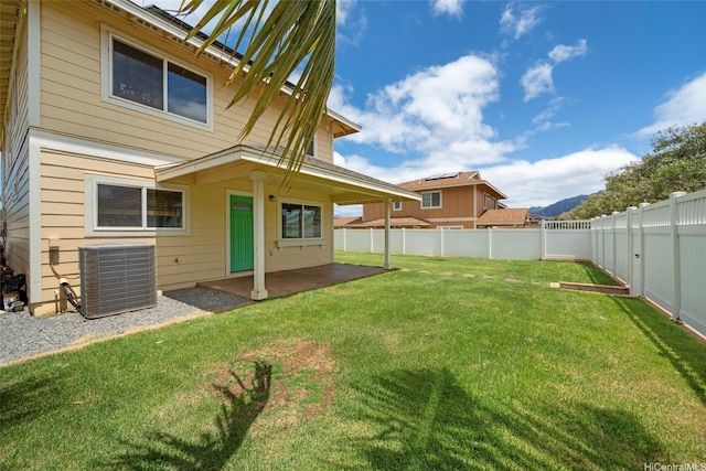 87-1847 Polikua St, Waianae, HI 96792 - back of property featuring a patio area, a fenced backyard, and a mountain view