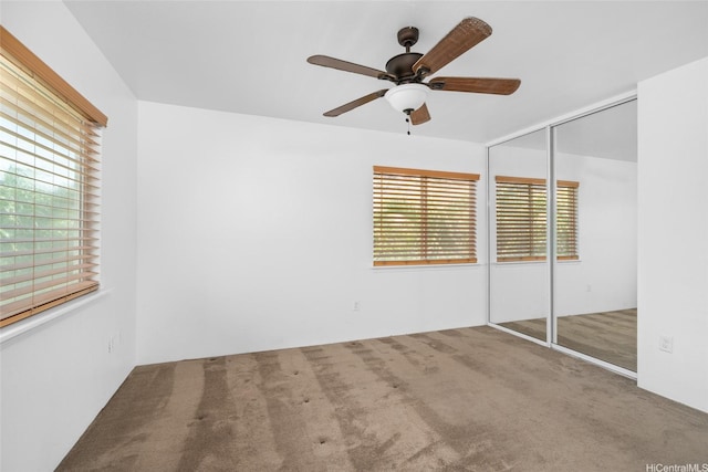 87-1847 Polikua St, Waianae, HI 96792 - unfurnished bedroom with carpet flooring, a closet, and a ceiling fan