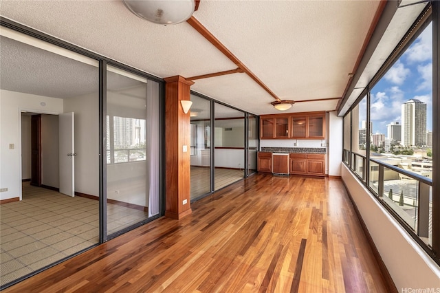 581 Kamoku St Unit 1008, Honolulu, HI 96826 - unfurnished sunroom featuring a city view