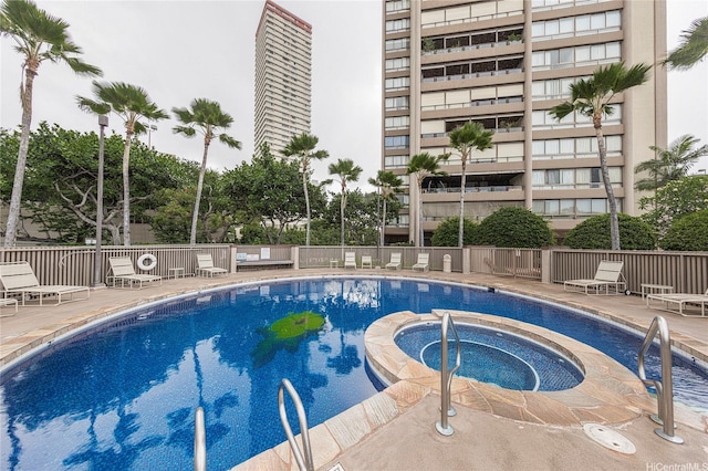 581 Kamoku St Unit 1008, Honolulu, HI 96826 - pool featuring fence, a patio, and a hot tub