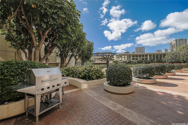 581 Kamoku St Unit 1008, Honolulu, HI 96826 - view of home's community with a patio area