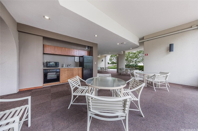 581 Kamoku St Unit 1008, Honolulu, HI 96826 - view of patio / terrace featuring outdoor dining area