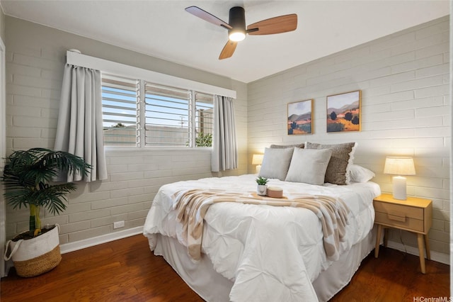 75 Kihapai St Unit 10, Kailua, HI 96734 - bedroom with a ceiling fan, baseboards, and wood finished floors