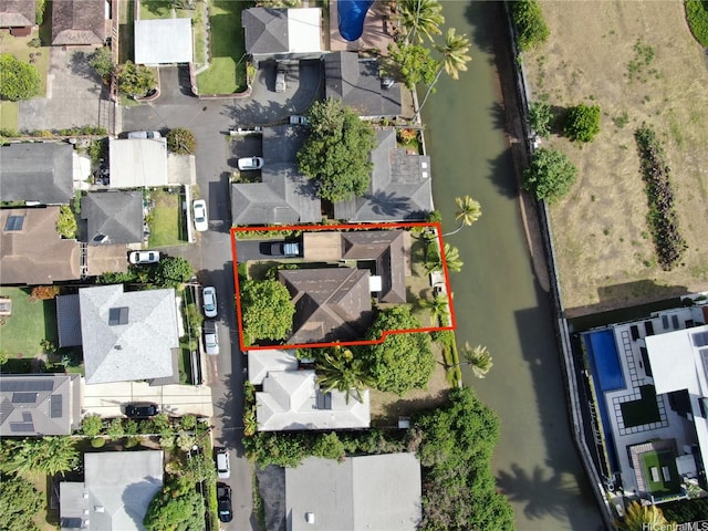 birds eye view of property with a residential view