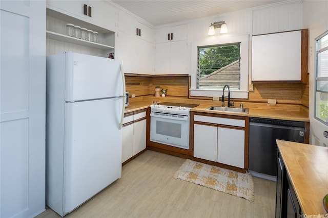 kitchen with white appliances, white cabinetry, open shelves, and a sink