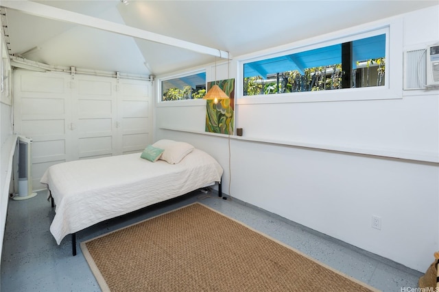 bedroom with speckled floor