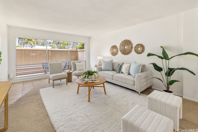 6215 Kawaihae Pl Unit B102, Honolulu, HI 96825 - living room featuring tile patterned flooring and a textured ceiling